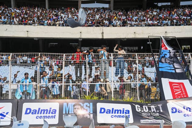 KOLKATA, INDIA - DECEMBER 13: Angry fans vandalise banners, throw bottles, ripped up seats and threw them on the pitch after Argentina football star Lionel Messi s early departure from the Salt Lake Stadium during his India Tour, on December 13, 2025 in Kolkata, India. Football fans were angry that, despite buying tickets at steep prices, they were not even able to catch a glimpse of their favourite star. Lionel Messi is on his G.O.A.T. India tour 2025, and he arrived in Kolkata in the early hours of Saturday (December 13, 2025). (Photo by Samir Jana Hindustan Times ) Argentina Football Star Lionel Messi Visits Kolkata: Upset Fans Vandalise Salt Lake Stadium