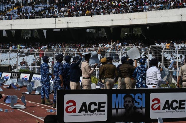 KOLKATA, INDIA - DECEMBER 13: Angry fans vandalise banners, throw bottles, ripped up seats and threw them on the pitch after Argentina football star Lionel Messi s early departure from the Salt Lake Stadium during his India Tour, on December 13, 2025 in Kolkata, India. Football fans were angry that, despite buying tickets at steep prices, they were not even able to catch a glimpse of their favourite star. Lionel Messi is on his G.O.A.T. India tour 2025, and he arrived in Kolkata in the early hours of Saturday (December 13, 2025). (Photo by Samir Jana Hindustan Times ) Argentina Football Star Lionel Messi Visits Kolkata: Upset Fans Vandalise Salt Lake Stadium