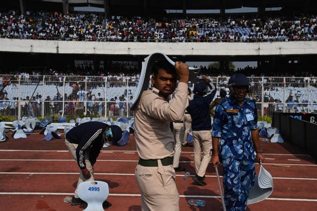 KOLKATA, INDIA - DECEMBER 13: Angry fans vandalise banners, throw bottles, ripped up seats and threw them on the pitch after Argentina football star Lionel Messi s early departure from the Salt Lake Stadium during his India Tour, on December 13, 2025 in Kolkata, India. Football fans were angry that, despite buying tickets at steep prices, they were not even able to catch a glimpse of their favourite star. Lionel Messi is on his G.O.A.T. India tour 2025, and he arrived in Kolkata in the early hours of Saturday (December 13, 2025). (Photo by Samir Jana Hindustan Times ) Argentina Football Star Lionel Messi Visits Kolkata: Upset Fans Vandalise Salt Lake Stadium