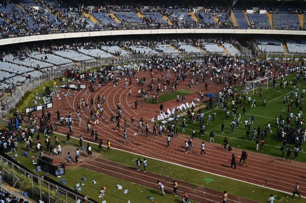 KOLKATA, INDIA - DECEMBER 13: Angry fans vandalise banners, throw bottles, ripped up seats and threw them on the pitch after Argentina football star Lionel Messi s early departure from the Salt Lake Stadium during his India Tour, on December 13, 2025 in Kolkata, India. Football fans were angry that, despite buying tickets at steep prices, they were not even able to catch a glimpse of their favourite star. Lionel Messi is on his G.O.A.T. India tour 2025, and he arrived in Kolkata in the early hours of Saturday (December 13, 2025). (Photo by Samir Jana Hindustan Times ) Argentina Football Star Lionel Messi Visits Kolkata: Upset Fans Vandalise Salt Lake Stadium