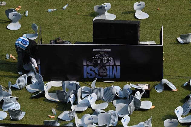 KOLKATA, INDIA - DECEMBER 13: Angry fans vandalise banners, throw bottles, ripped up seats and threw them on the pitch after Argentina football star Lionel Messi s early departure from the Salt Lake Stadium during his India Tour, on December 13, 2025 in Kolkata, India. Football fans were angry that, despite buying tickets at steep prices, they were not even able to catch a glimpse of their favourite star. Lionel Messi is on his G.O.A.T. India tour 2025, and he arrived in Kolkata in the early hours of Saturday (December 13, 2025). (Photo by Samir Jana Hindustan Times ) Argentina Football Star Lionel Messi Visits Kolkata: Upset Fans Vandalise Salt Lake Stadium