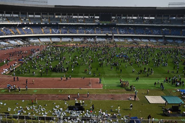 KOLKATA, INDIA - DECEMBER 13: Angry fans vandalise banners, throw bottles, ripped up seats and threw them on the pitch after Argentina football star Lionel Messi s early departure from the Salt Lake Stadium during his India Tour, on December 13, 2025 in Kolkata, India. Football fans were angry that, despite buying tickets at steep prices, they were not even able to catch a glimpse of their favourite star. Lionel Messi is on his G.O.A.T. India tour 2025, and he arrived in Kolkata in the early hours of Saturday (December 13, 2025). (Photo by Samir Jana Hindustan Times ) Argentina Football Star Lionel Messi Visits Kolkata: Upset Fans Vandalise Salt Lake Stadium