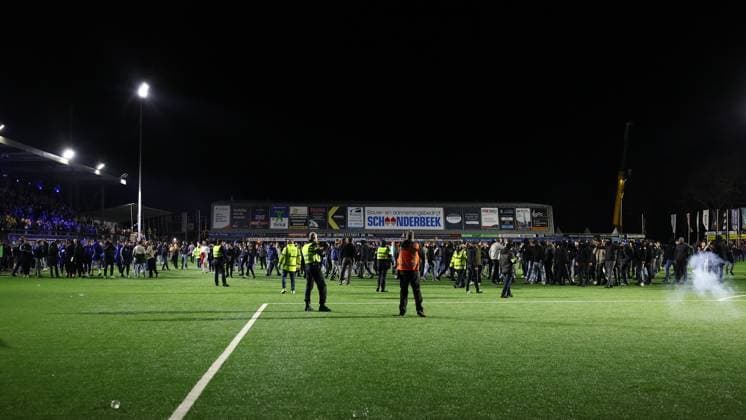 SPAKENBURG , 18-12-2025 , Sportpark De Westmaat , season 2025 2026, Dutch KNVB Beker Football , match between Spakenburg and FC Twente , picture shows police and supporters on the pitch Spakenburg - Twente (cup)  x200264057x Copyright: