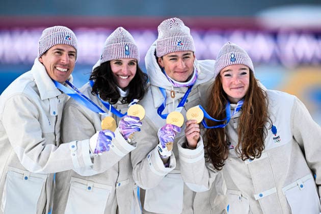 ANTERSELVA, ITALY 20260208 The French team wins the mixed 4x6 km biathlon relay during the Winter Olympics in Anterselva, Italy. From left: Julia Simon, Lou Jeanmonnot, Quentin Fillon Maillet and Eric Perrot. ANTERSELVA ITALY x10050x