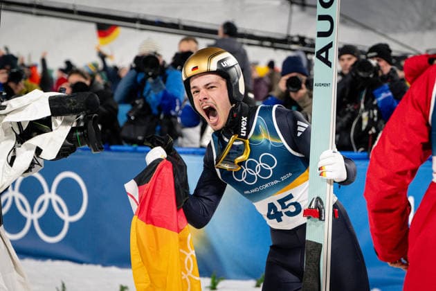 Philipp Raimund ( Deutschland ) celebrating his Gold Medal, Ski jumping, Skispringen, Ski, nordisch Men Normal Hill Milano Cortina 2026 Olympic Games, Olympische Spiele, Olympia, OS 09-02-2026 Copyright: HMBxMedia MarcxNiemeyer