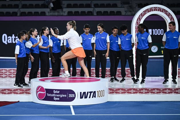 Qatar TotalEnergies Open 2026 Final, victory ceremony, winner Karolina Muchova (CZE) with ball kids Karolina Muchova (CZE)