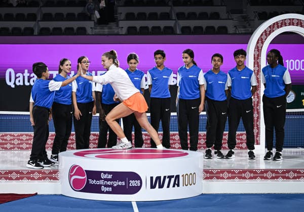 Qatar TotalEnergies Open 2026 Final, victory ceremony, winner Karolina Muchova (CZE) with ball kids Karolina Muchova (CZE)