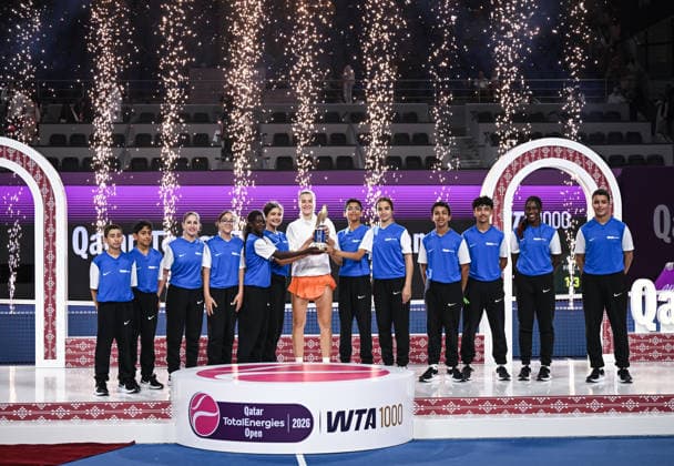 Qatar TotalEnergies Open 2026 Final, victory ceremony, winner Karolina Muchova (CZE) with ball kids Karolina Muchova (CZE)