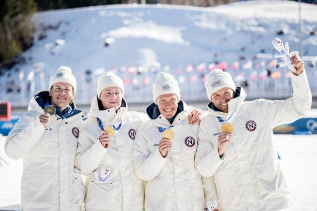 260215 Emil Iversen, Martin Lowstrom Nyenget, Einar Hedegart and Johannes Hosflot Klaebo of Norway celebrate on the podium after the men s 4 x 7.5km relay cross-country skiing race during day 9 of the 2026 Winter Olympics on February 15, 2026 in Val di Fiemme. Photo: Maxim Thore BILDBYRAN kod MT MT0983 skidor cross-country skiing langrenn Olympic Games, Olympische Spiele, Olympia, OS olympics winter olympics os ol olympiska spel vinter-os olympiske leker milano cortina 2026 milan cortina 2026 milano cortina 2026 olympic games milano cortina 2026 winter olympic games milano cortina-os milano cortina-ol vinter-ol 9 bbeng herr stafett norge jubel Copyright: MAXIMxTHORE BB260215MT094