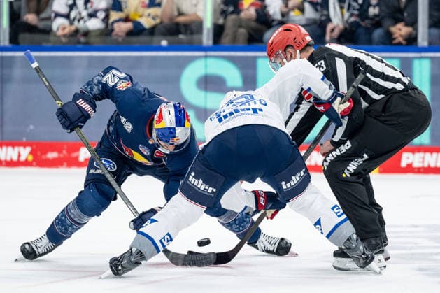 Linesperson Joshua Roemer fuehrt ein Bully Faceoff aus zwischen Brady Ferguson (EHC Red Bull Muenchen, 12) und Luke Esposito (Adler Mannheim, 19) GER, EHC Red Bull Muenchen vs. Adler Mannheim, Eishockey, DEL, Playoffs, Halbfinale Spiel 2, Saison 2025 2026, 10.04.2026. GER, EHC Red Bull Muenchen vs. Adler Mannheim, Eishockey, DEL, Playoffs, Halbfinale Spiel 2, Saison 2025 2026, 10.04.2026. Muenchen Copyright: xEibner-Pressefoto HeikexFeinerx EP_HFR