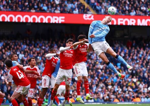 Erling Haaland of Manchester City wins a header Manchester City v Arsenal, Premier League, Football, Etihad Stadium, Manchester, UK - 19 Apr 2026Manchester Etihad Stadium United Kingdom EDITORIAL USE ONLY No use with unauthorised audio, video, data, fixture lists, club league logos or live services. Online in-match use limited to 120 images, no video emulation. No use in betting, games or single club league player publications. Copyright: xMattxWest Shutterstockx 16836204w
