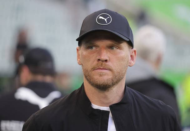 Trainer Eugen Polanski (Borussia Moenchengladbach) Fussball, Herren, Saison 2025 2026, 1.Liga, Bundesliga, Volkswagenarena, VfL Wolfsburg gegen Borussia Moenchengladbach DFL REGULATIONS PROHIBIT ANY USE OF PHOTOGRAPHS AS IMAGE SEQUENCES AND OR QUASI-VIDEO.