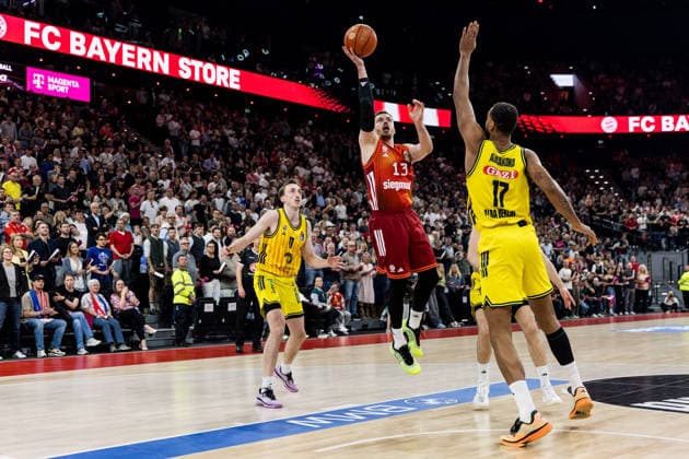 MUNICH, GERMANY - MAY 01: Andreas Andi Obst (FC Bayern Muenchen, 13) shoots the ball over Norris Agbakoko (Alba Berlin, 17) during the easyCredit Basketball Bundesliga match between FC Bayern Muenchen vs. Alba Berlin at SAP Garden on matchday 27 of the easyCredit Basketball Bundesliga on May 01, 2026 in Munich, Germany. Bavaria Germany Copyright: xSteffiexWunderlx