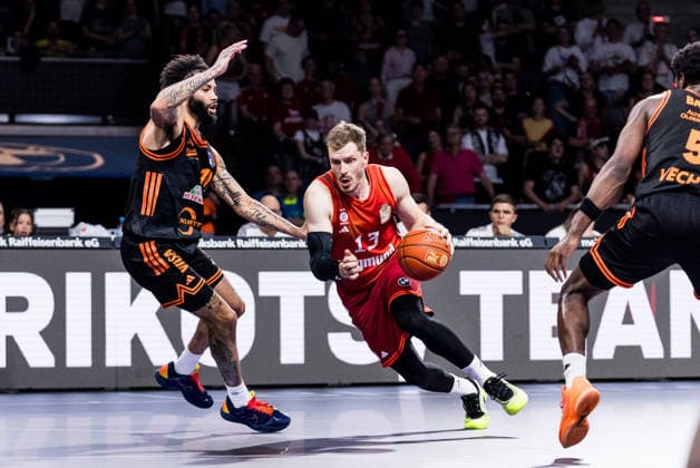 MUNICH, GERMANY - MAY 03: Andreas Andi Obst (FC Bayern Muenchen, 13) controls the ball against Tevin Brown (Rasta Vechta, 10) during the easyCredit Basketball Bundesliga match between FC Bayern Muenchen vs. Rasta Vechta at BMW Park on matchday 32 of the easyCredit Basketball Bundesliga on May 03, 2026 in Munich, Germany. Bavaria Germany Copyright: xSteffiexWunderlx