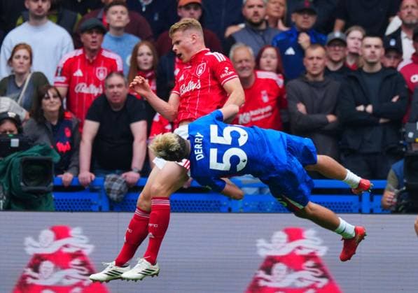 Jesse Derry of Chelsea collides with Zach Abbott of Nottingham Forest Chelsea v Nottingham Forest, Premier League, Football, Stamford Bridge, London , UK - 04 May 2026London Stamford Bridge United Kingdom EDITORIAL USE ONLY No use with unauthorised audio, video, data, fixture lists, club league logos or live services. Online in-match use limited to 120 images, no video emulation. No use in betting, games or single club league player publications. Copyright: xJavierxGarcia Shutterstockx 16854610ai