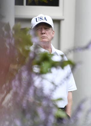 October 14, 2017 - Washington, District of Columbia, United States of America - United States President Donald J. Trump in the First Lady s garden of the White House in Washington, DC following a round of golf with US Senator Lindsey Graham (Republican of South Carolina) on Saturday, October 14, 2017..Credit: Ron Sachs Pool via CNP Copyright: xRonxSachs CNPx