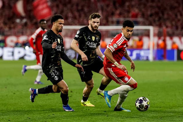MUNICH, GERMANY - MAY 6: Luis Diaz (FC Bayern Muenchen, 14) chased by Warren Zaire-Emery (FC Paris Saint-Germain, 33) and Khvicha Kvaratskhelia (FC Paris Saint-Germain, 7) during the UEFA Champions League Semi-Final between FC Bayern Muenchen vs Paris Saint-Germain at Allianz Arena at Semi-Finals 2nd leg of the UEFA Champions League on May 6, 2026 in Munich, Germany. Bavaria Germany Copyright: xSteffiexWunderlx