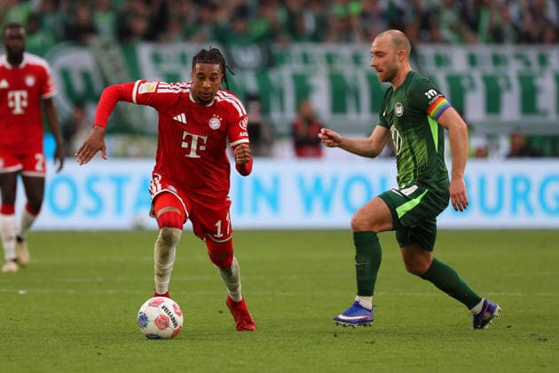 VfL vs. Bayern, 1. BL Wolfsburg, 09.05.2026, Fußball, Herren, Saison 2025 2026, 1. BL, VfL Wolfsburg vs. FC Bayern München: Michael Olise (FC Bayern München), Christian Eriksen (VfL Wolfsburg) (DFL DFB REGULATIONS PROHIBIT ANY USE OF PHOTOGRAPHS as IMAGE SEQUENCES and or QUASI-VIDEO) Volkswagen Arena Niedersachsen Deutschland