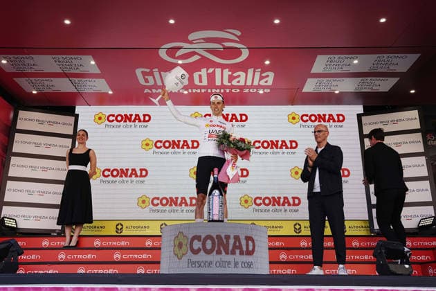 Switzerland™s Jan Christen of UAE Team Emirates XRG white jersey on the podium during Stage 4 of the Giro d™Italia, from Catanzaro to Cosenza, Italy, Tuesday, May 12, 2026.  Copyright: xGianxMattiaxD Albertox xLaPressex