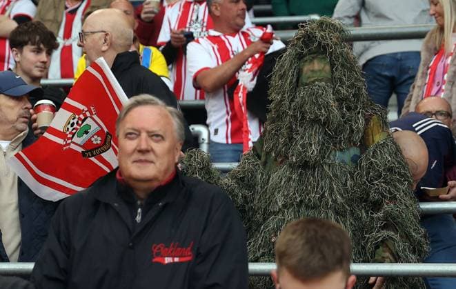 A Southampton fan in full camoflage ahead of kick off Southampton v Middlesbrough, EFL Sky Bet Championship, Play-Off Semi Final, Second Leg, Football, St Mary s Stadium, Southampton, UK - 12 May 2026Southampton St Mary s Stadium United Kingdom EDITORIAL USE ONLY No use with unauthorised audio, video, data, fixture lists, club league logos or live services. Online in-match use limited to 120 images, no video emulation. No use in betting, games or single club league player publications. Copyright: xKieranxMcManus Shutterstockx 16871478ah