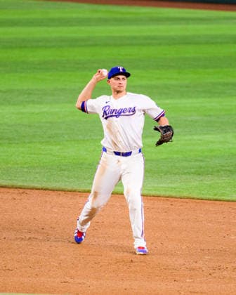 May 12, 2026, Arlington, Texas, USA: Texas Rangers shortstop COREY SEAGER (5) prepares to throw the ball for an out at first base during the game between the Texas Rangers and the Arizona Diamondbacks. Texas Rangers Win 7-4  - ZUMAm348 20260512_znp_m348_016 Copyright: xLuisxRevillaxMatax
