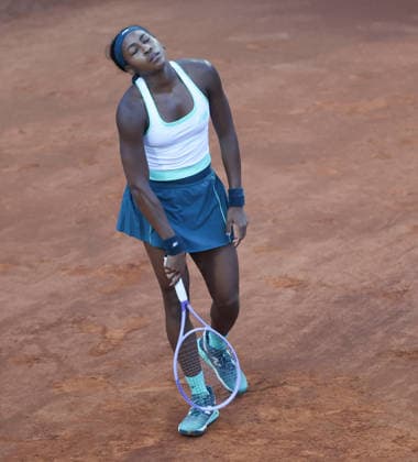 (260513) -- ROME, May 13, 2026 -- Coco Gauff of the United States reacts after losing a point during the women s singles quarterfinal between Coco Gauff of the United States and Mirra Andreeva of Russia at the WTA, Tennis Damen Italian Open in Rome, Italy, May 12, 2026. ) (SP)ITALY-ROME-TENNIS-WTA-ITALIAN OPEN LixJing 