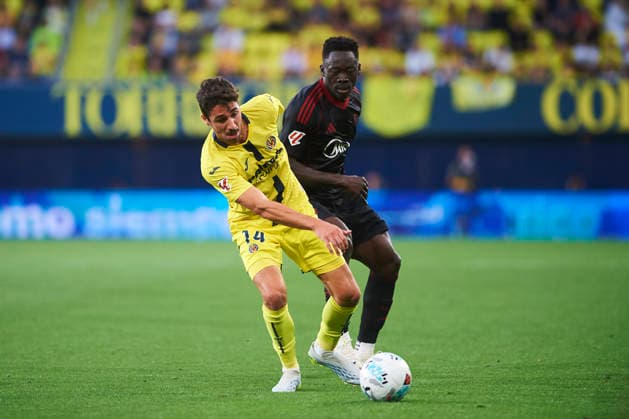 Santi Comesana (Villarreal CF) and Akor Adams (Sevilla FC) during the LaLiga EA Sports match between Villarreal CF and Sevilla FC at Estadio de la Ceramica on May 13, 2026 in Villarreal, Spain. (Photo by Maria Jose Segovia DeFodi Images) -