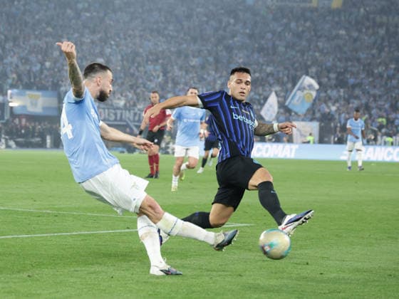 Coppa Italia final SS Lazio and FC Internazionale lazio™s Spanish defender Mario Gila challenges for the ball with Inter™s Argentinian forward Lautaro Martinez during the Coppa Italia final between SS Lazio and FC Internazionale at the Stadio Olimpico in Rome on 13 May 2026. ABP19931 Copyright: xAntonioxBalascox