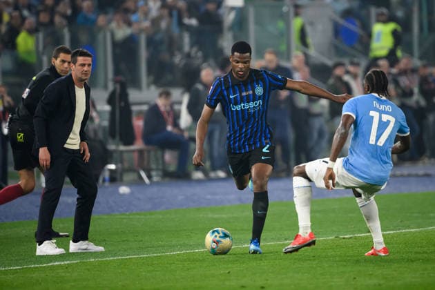 Cristian Chivu, head coach of FC Internazionale, Denzel Dumfries of FC Internazionale and Nuno Tavares of SS Lazio during the 2025 2026 Coppa Italia football final between SS Lazio and FC Internazionale at Stadio Olimpico in Rome (Italy), May 13, 2026. AndreaxStaccioli