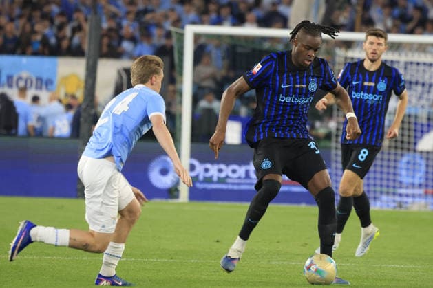Lazio v Inter Milan - Italian Cup final match ROME, ITALY, MAY 13: Yann Aurel Bisseck (R), of Inter Milan, is challenged by Kenneth Taylor (L), of Lazio, during the Italian Cup football final match between Lazio and Inter Milan at the Olympic stadium in Rome, Italy, on May 13, 2026. Riccardo De Luca Anadolu Rome Italy. Editorial use only. Please get in touch for any other usage.  Copyright: x2026xAnadoluxRiccardoxDexLucax