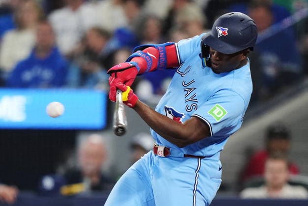 May 13, 2026, Toronto, On, CANADA: Toronto Blue Jays Jesus Sanchez (12) singles against the Tampa Bay Rays during fourth inning MLB, Baseball Herren, USA baseball action in Toronto on Wednesday, May 13, 2026. Canada News - May 13, 2026  - ZUMAc35_ 20260513_zaf_c35_160 Copyright: xNathanxDenettex