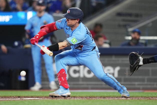 May 13, 2026, Toronto, On, CANADA: Toronto Blue Jays Tyler Heineman (55) hits a sacrifice bunt against the Tampa Bay Rays during fifth inning MLB, Baseball Herren, USA baseball action in Toronto on Wednesday, May 13, 2026. Canada News - May 13, 2026  - ZUMAc35_ 20260513_zaf_c35_162 Copyright: xNathanxDenettex