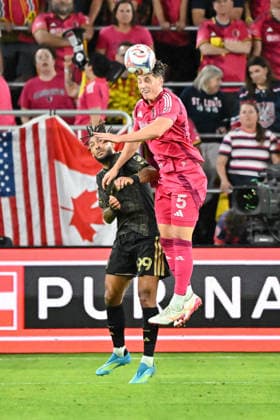 ST. LOUIS, MO - MAY 13: Lukas MacNaughton (5) of the St. Louis CITY SC steps in front of Denis Bouanga (99) of the Los Angeles Football Club to head the ball away during the MLS, Fussball Herren, USA regular season match where St. Louis CITY SC hosted Los Angeles Football Club on Wednesday May 13th, 2026, at Energizer Park in St. Louis City, MO. (Photo by Rick Ulreich Icon Sportswire) SOCCER: MAY 13 MLS St. Louis CITY SC vs Los Angeles Football Club EDITORIAL USE ONLY Icon26051344