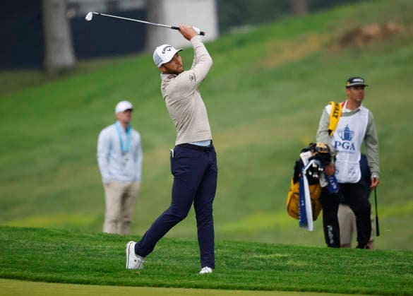 Sam Burns watches his approach shot on the 10th hole during the first round of the 2026 PGA, Golf Herren Championship at Aronimink Golf Club in Newtown Square, Pennsylvania, on Thursday, May 14, 2026.  PHI20260514806 LAURENCExKESTERSON