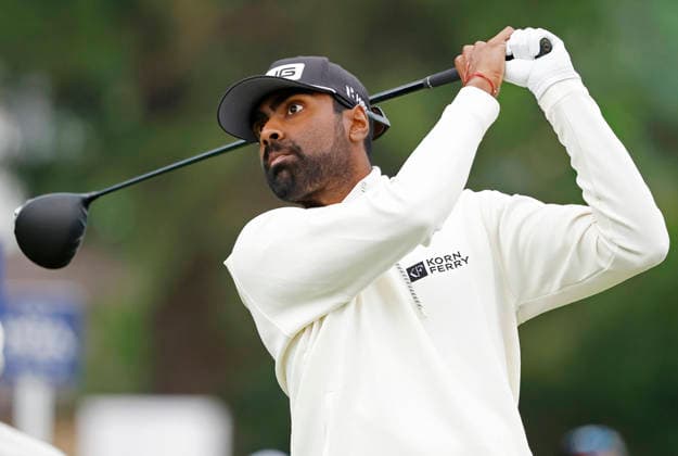 Sahith Theegala watches his tee shot on the 11th hole during the first round of the 2026 PGA, Golf Herren Championship at Aronimink Golf Club in Newtown Square, Pennsylvania, on Thursday, May 14, 2026.  PHI20260514814 LAURENCExKESTERSON