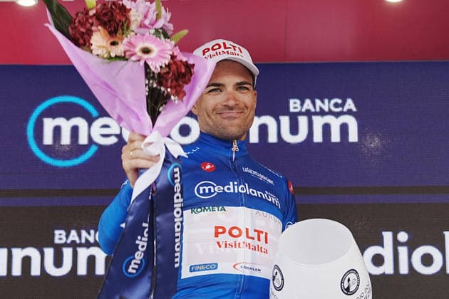 Spain™s Diego Pablo Sevilla Lopez of Team Polti VisitMalta azure jersey on the podium during Stage 6 of the Giro d™Italia, from Paestum to Naples, Italy, Thursday, May 14, 2026.  Copyright: xGianxMattiaxD Albertox xLaPressex