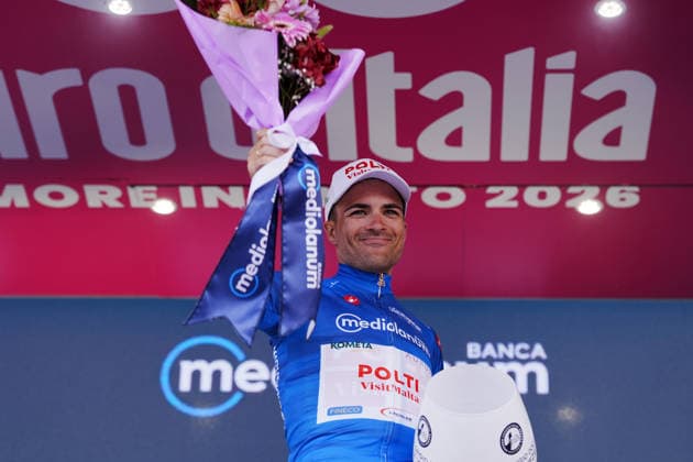 The blue jersey Spain™s Diego Pablo Sevilla Lopez of Team Polti VisitMalta celebrate on the podium after the Stage 6 of the Giro d™Italia, from Paestum to Naples, Italy, Thursday, May 14, 2026.  Copyright: xMassimoxPaolone LaPressex