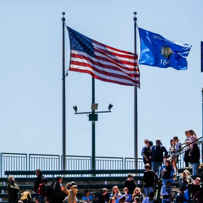 The American and Wisconsin state flags fly before the start of the MLB, Baseball Herren, USA game between the San Diego Padres and the Milwaukee Brewers at American Family Field in Milwaukee, Wisconsin on Thursday, May 14, 2026.  MIL20260514801 TANNENxMAURY