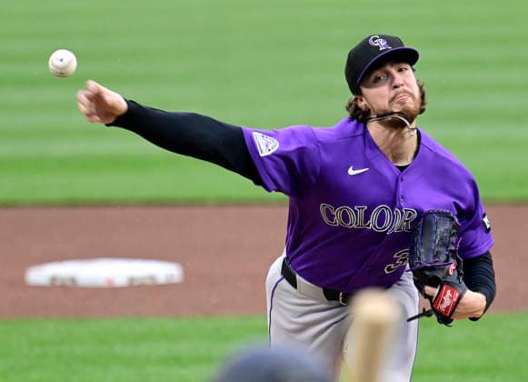 Colorado Rockies pitcher Chase Dollander (32) starts against the Pittsburgh Pirates at PNC Park on Thursday, May 14, 2026 in Pittsburgh.  PIT2026051410 ArchiexCarpenter