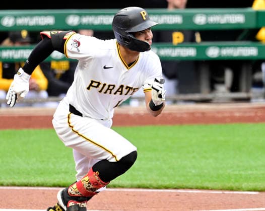 Pittsburgh Pirates catcher (13) Endy Rodigguez doubles in the second inning against the Colorado Rockies at PNC Park on Thursday, May 14, 2026 in Pittsburgh.  PIT2026051413 ArchiexCarpenter