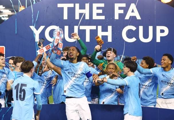 Manchester City lift the FA Youth Cup trophy at the end of the match Manchester City U18 v Manchester United, ManU U18, FA Youth Cup Final, Football, Joie Stadium, Manchester , UK - 14 May 2026Manchester Joie Stadium United Kingdom EDITORIAL USE ONLY No use with unauthorised audio, video, data, fixture lists, club league logos or live services. Online in-match use limited to 120 images, no video emulation. No use in betting, games or single club league player publications. Copyright: xMattxWest Shutterstockx 16871363aj