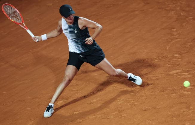 (260515) -- ROME, May 15, 2026 -- Iga Swiatek of Poland hits a return during the women s singles semifinal match between Elina Svitolina of Ukraine and Iga Swiatek of Poland at the WTA, Tennis Damen Italian Open in Rome, Italy, May 14, 2026. ) (SP)ITALY-ROME-TENNIS-WTA-ITALIAN OPEN-ELINA SVITOLINA VS IGA SWIATEK LixJing 