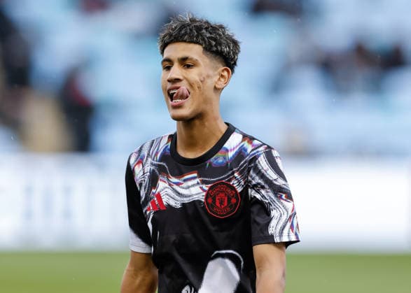 Manchester, England, 14th May 2026. Joseph Junior Andreou Gabriel (JJ Gabriel) of Manchester United, ManU warms up ahead of the Manchester City U18 vs Manchester United U18 FA Youth Cup Final match at the Academy Stadium, Manchester. Picture credit should read: Cody Froggatt Sportimage EDITORIAL USE ONLY. No use with unauthorised audio, video, data, fixture lists, club league logos or live services. Online in-match use limited to 120 images, no video emulation. No use in betting, games or single club league player publications. SPI_111_CF_MANCHESTER_CITY_U18_V_MANCHESTER_UNITED_U18 SPI-4801-0109