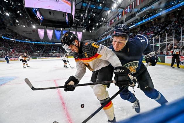 ZURICH, SWITZERLAND - MAY 15: Jesse Puljujarvi of Finland and Kai Wissmann of Germany in a battle along the boards during the 2026 IIHF Ice hockey, Eishockey World Championship, WM, Weltmeisterschaft Switzerland game between Finland and Germany at Swiss Life Arena on May 15, 2026 in Zurich, Zurich. Zurich Swiss Life Arena Zurich Switzerland Copyright: xJustPictures.ch AndreaxBrancax jp-en-EuSpIm-JP7_ANB_Fin_Ger_15052026_1407