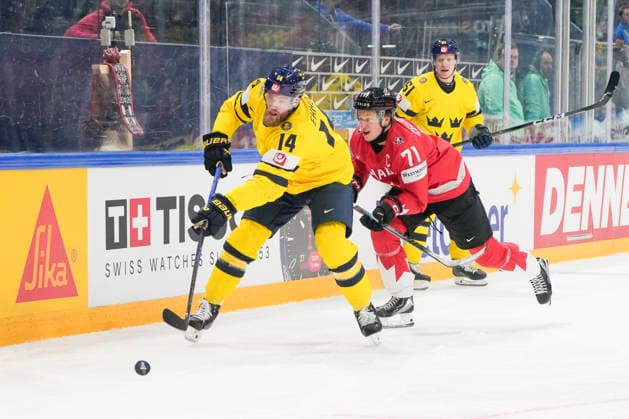 FRIBOURG, SWITZERLAND - MAY 15: Mattias Ekholm of Sweden L) against Macklin Celebrini of Canada R) during the 2026 IIHF Ice hockey, Eishockey World Championship, WM, Weltmeisterschaft Switzerland game between Canada and Sweden at BCF Arena on May 15, 2026 in Fribourg, Fribourg. Fribourg BCF Arena Fribourg Switzerland Copyright: xJustPictures.ch JarixPestelaccix jp-en-EuSpIm-JP6_JAR_Canada_Sweden_15May2026_00091