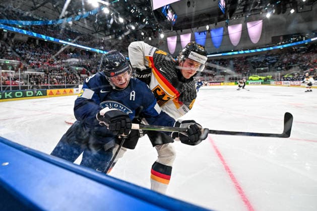 ZURICH, SWITZERLAND - MAY 15: Olli Maatta of Finland and Joshua Samanski of Germany in a battle along the boards during the 2026 IIHF Ice hockey, Eishockey World Championship, WM, Weltmeisterschaft Switzerland game between Finland and Germany at Swiss Life Arena on May 15, 2026 in Zurich, Zurich. Zurich Swiss Life Arena Zurich Switzerland Copyright: xJustPictures.ch AndreaxBrancax jp-en-EuSpIm-JP7_ANB_Fin_Ger_15052026_1569