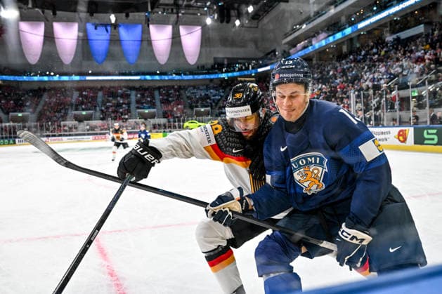 ZURICH, SWITZERLAND - MAY 15: Fabio Wagner of Germany and Jesse Puljujarvi of Finland in a battle along the boards during the 2026 IIHF Ice hockey, Eishockey World Championship, WM, Weltmeisterschaft Switzerland game between Finland and Germany at Swiss Life Arena on May 15, 2026 in Zurich, Zurich. Zurich Swiss Life Arena Zurich Switzerland Copyright: xJustPictures.ch AndreaxBrancax jp-en-EuSpIm-JP7_ANB_Fin_Ger_15052026_2017