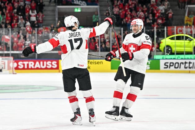 ZURICH, SWITZERLAND - MAY 15: Ken Jager of Switzerland L) celebrates his goal with Christian Marti of Switzerland R) during the 2026 IIHF Ice hockey, Eishockey World Championship, WM, Weltmeisterschaft Switzerland game between USA and Switzerland at Swiss Life Arena on May 15, 2026 in Zurich, Zurich. Zurich Swiss Life Arena Zurich Switzerland Copyright: xJustPictures.ch AndreaxBrancax jp-en-EuSpIm-JP7_ANB_US_Sui_15052026_0450
