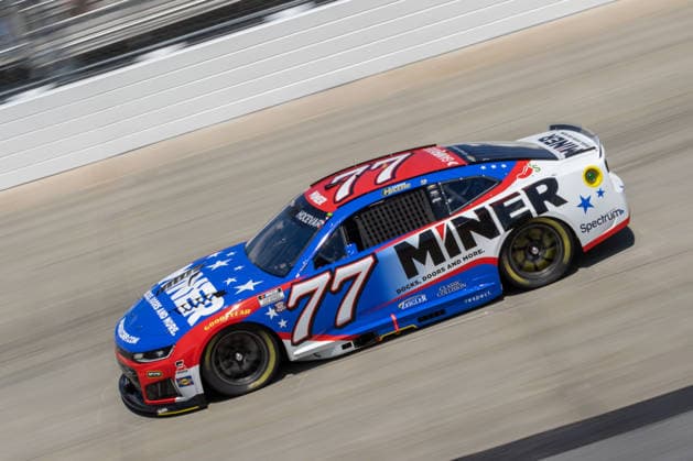 DOVER, DE - MAY 15: Carson Hocevar ( 77 Spire Motorsports Miner Docks Doors and More Chevrolet) on track during practice for Sunday™s NASCAR, Motorsport, USA Cup Series All-Star Race on May 15, 2026, at Dover Motor Speedway in Dover, DE. (Photo by David Hahn Icon Sportswire) AUTO: MAY 15 NASCAR Cup Series All-Star Race EDITORIAL USE ONLY Icon260515016