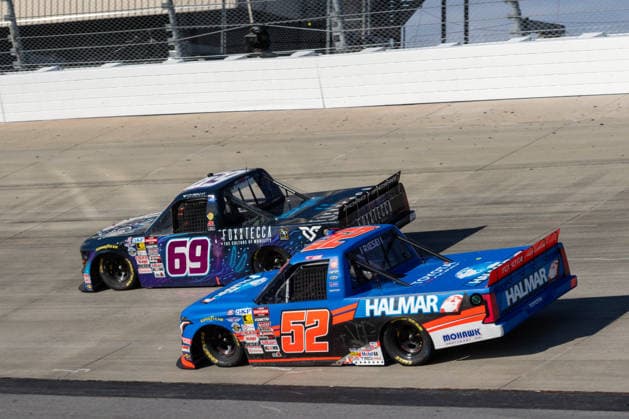 DOVER, DE - MAY 15: Stewart Friesen ( 52 Halmar Friesen Racing Halmar International Toyota) passes Dystany Spurlock ( 69 Motorsports Business Management Foxxtecca Ford) during the NASCAR, Motorsport, USA CRAFTSMAN Truck Series ECOSAVE 200 on May 15, 2026, at Dover Motor Speedway in Dover, DE. (Photo by David Hahn Icon Sportswire) AUTO: MAY 15 NASCAR CRAFTSMAN Truck Series ECOSAVE 200 EDITORIAL USE ONLY Icon260515018